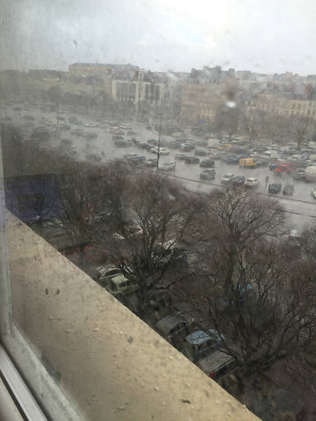 istock View of the city, rain on the window 856720896