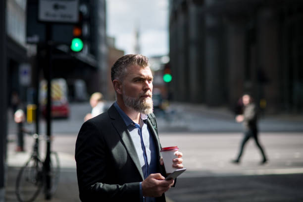 istock Businessman thinking about the meeting - London 856733868