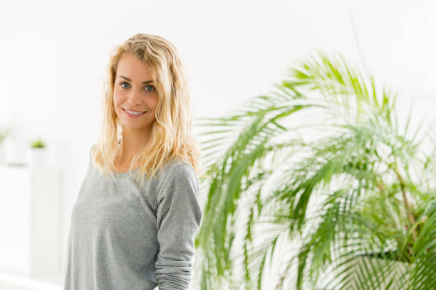 istock beautiful woman at home 856736090