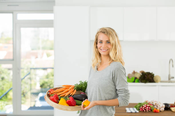 istock beautiful mother in kitchen 856736684
