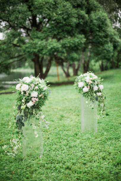 istock wedding arch with wedding decoration and river view 856736848