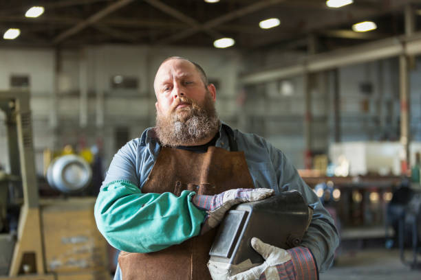 istock Welder in metal fabrication plant 856744072