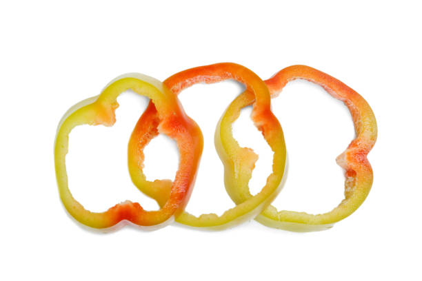 istock Slices of bell pepper isolated on white background 856744388