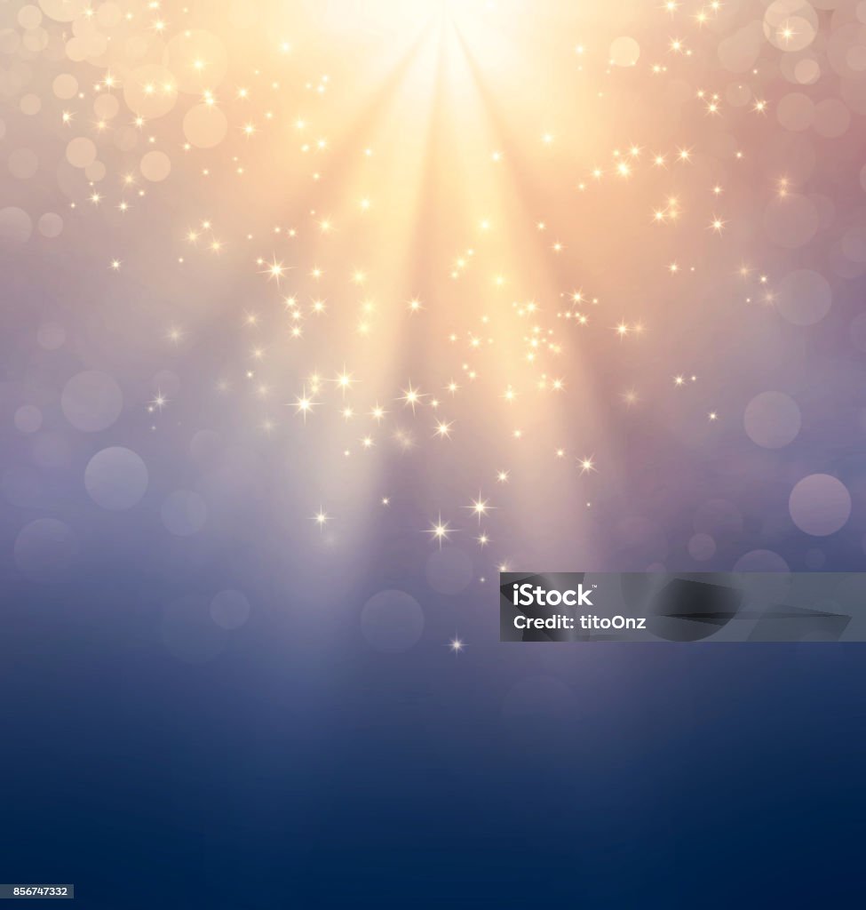 Holy light on gold Light down and stars falling on a festive gold background Backgrounds Stock Photo