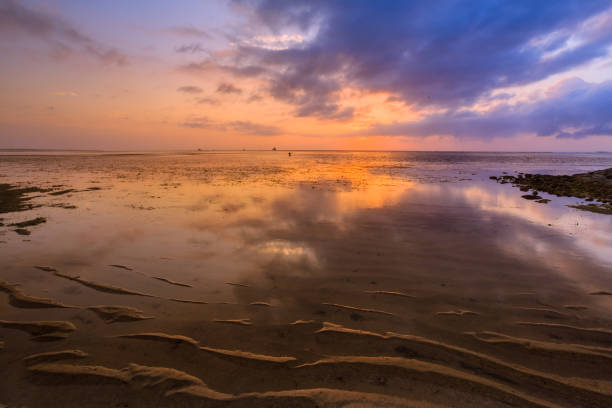 istock Sunrise on a Beach in Bali Indonesia 856750972