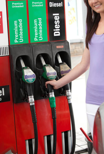 istock Young woman at the pump 856760390