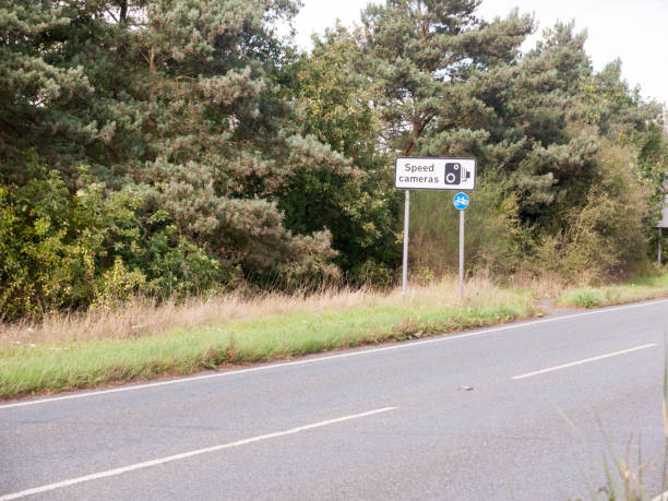 istock road sign speed camera black and white warning 856783174