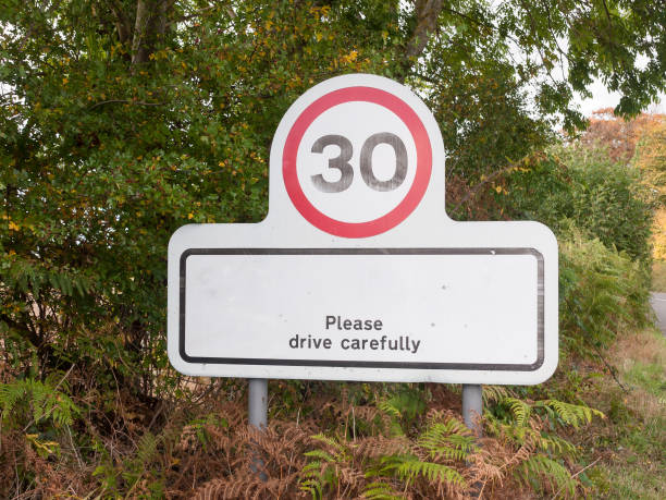istock village rectangle sign with 30 miles per hour speed limit 856783254