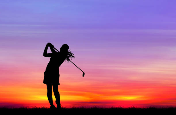 istock silhouette golfer playing golf during beautiful sunset 856783304