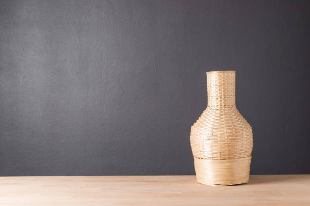 istock Wicker rattan vase from bamboo for decoration background 856790798