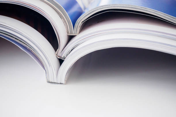 istock pile of magazines stack on white table in living room 856790908