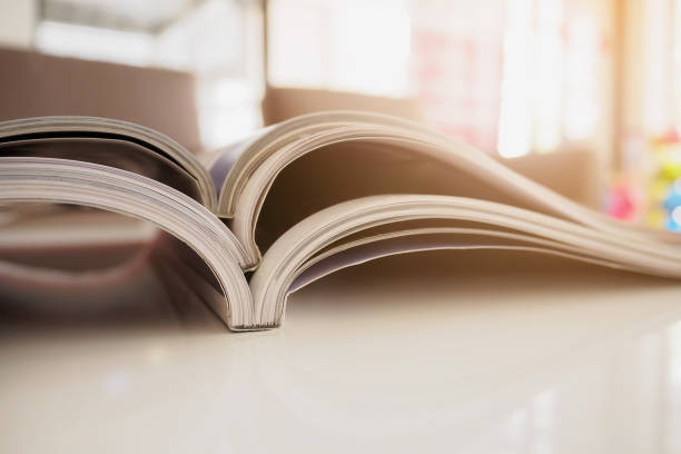istock pile of magazines stack on white table in living room 856790910