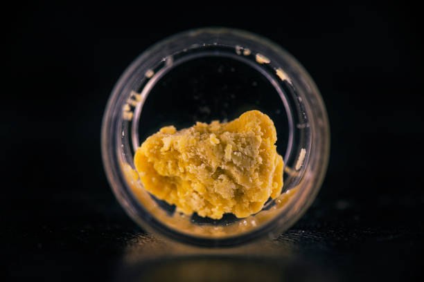 Cannabis extraction wax crumble isolated stock photo