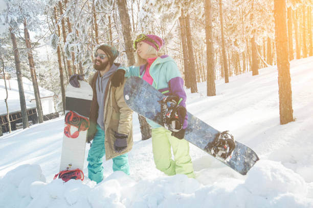 istock Snowboarders on snowy mountain 856791078