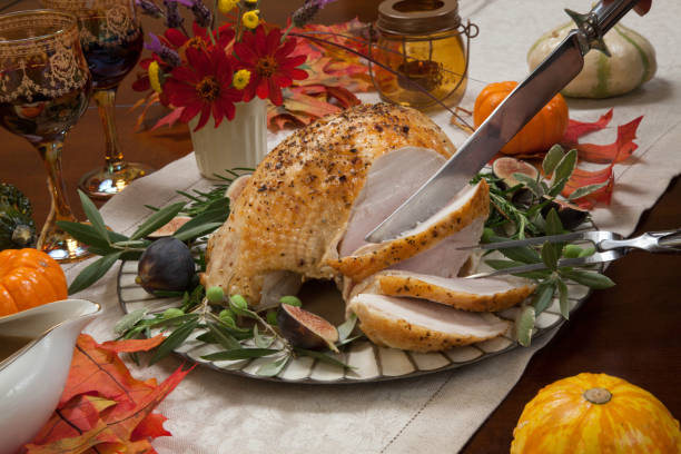 istock Carving Mediterranean Style Whole Roasted Turkey Breast 856791512