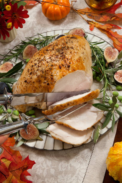 istock Carving Mediterranean Style Whole Roasted Turkey Breast 856791574