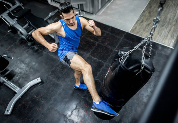 istock Man kickboxing at the gym 856794266