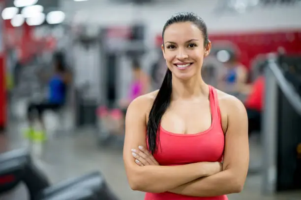 Photo of Portrait of a beautiful woman at the gym