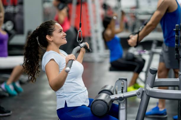 istock Strong woman exercising at the gym 856797586