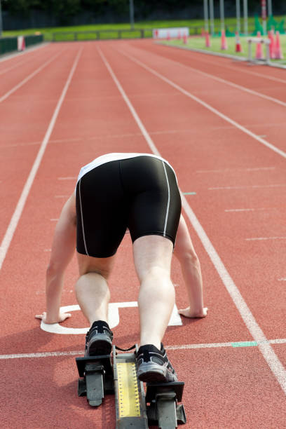 istock Sporty man waiting in starting block 856798436
