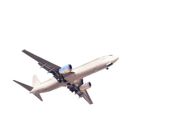 istock passenger airplane flying take off isolated on white background 856800698
