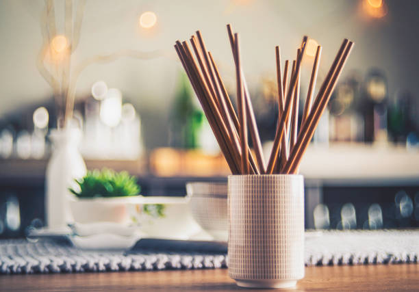 Chinese chopsticks on wooden background. Copy space for the text