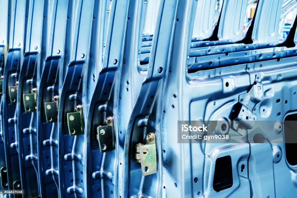 Automotive components: housings A car factory; neatly arranged exterior components of a car Automated Stock Photo