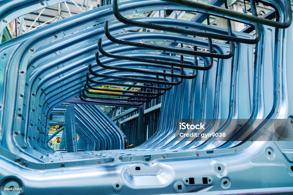 Automotive components: housings A car factory; neatly arranged exterior components of a car Manufacturing Stock Photo