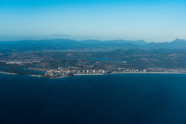 Aerial view of Coolangatta with distant mountains of Springbrook National Park , Gold Coast, Australia