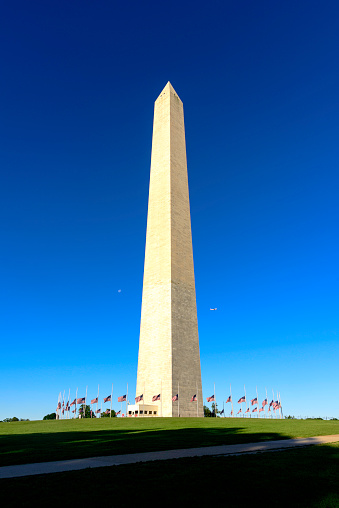 Washington Monument - Washington DC, American Flag, Blue sky