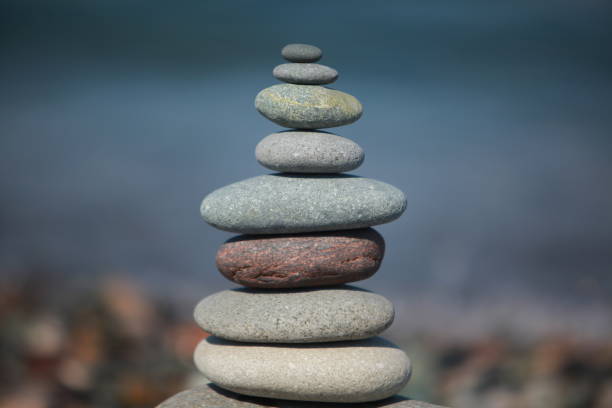 istock pyramid of pebbles on a sea beach 856837956