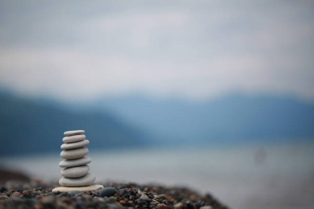 istock pyramid of pebbles on a sea beach 856839274