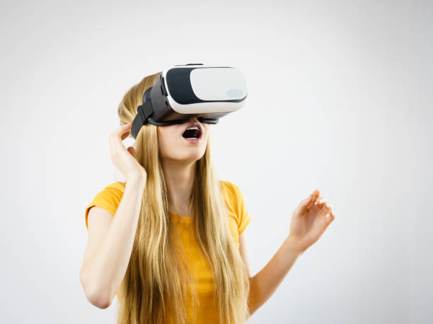 istock Girl wearing virtual reality goggles. 856842420