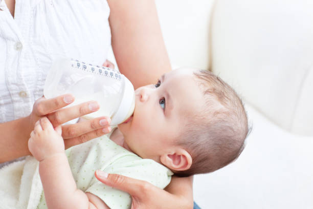 istock Peaceful baby boy lying in his mother 856845714