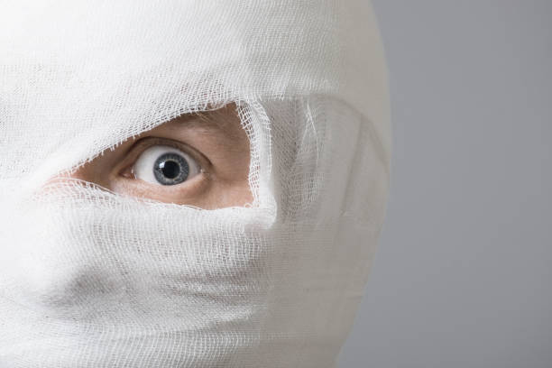 istock Poor ill man with bandage on his head 856850034