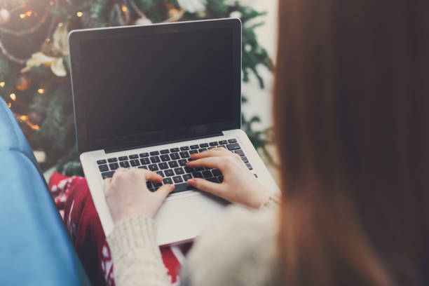Woman shopping online on laptop