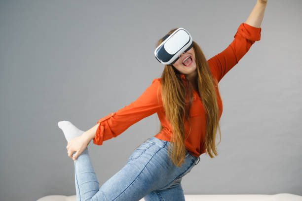 istock Girl wearing virtual reality goggles. 856857370