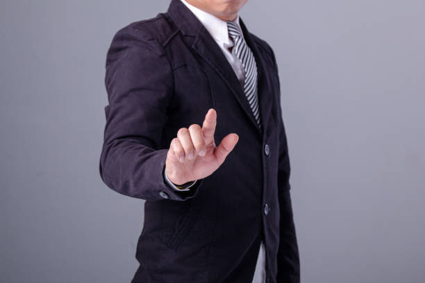 istock Business man with pointing to something or touching 856861334