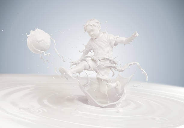 istock milk in form of Boy soccer player 856872602