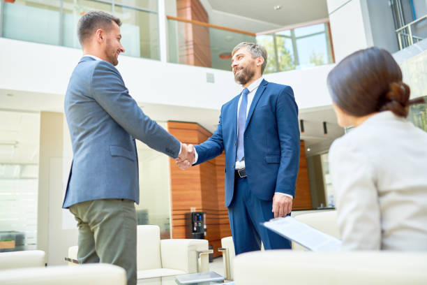 istock Firm Handshake of Business Partners 856880084