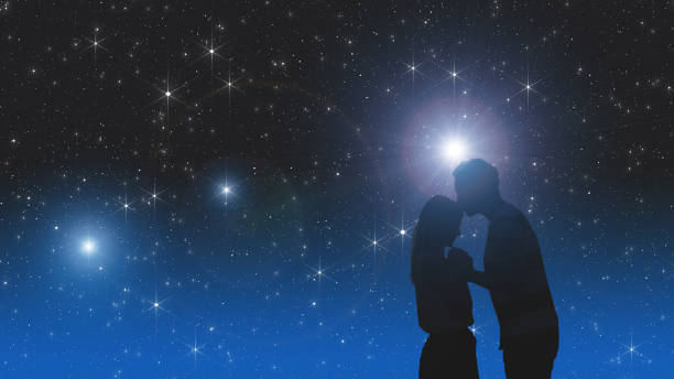 Silhouettes of a young couple under the starry sky. Elements of this image are my work. Silhouettes of a young couple under the starry sky. Elements of this image are my work. stars in your eyes stock pictures, royalty-free photos & images