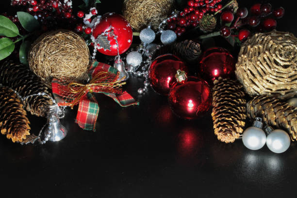 istock Christmas background with Christmas tree decorations on a black background 856887864