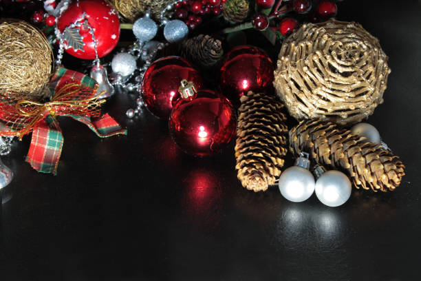 istock Christmas background with Christmas tree decorations on a black background 856887940