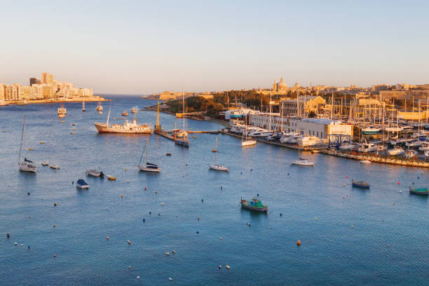 istock Valletta seafront skyline view across Marsamxett from Sliema, Malta. Panorama sunset view of Marsamxett harbour. 856892712
