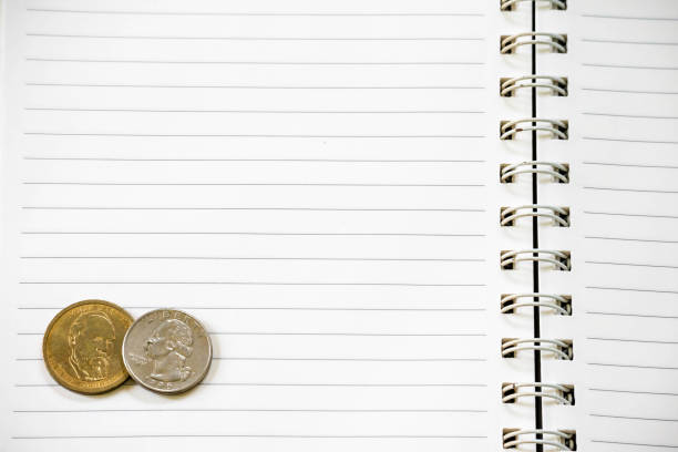 Creative flat lay of financial planning item, money notebook with copyspace