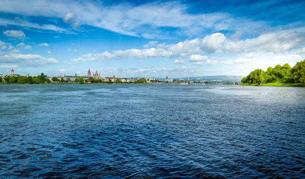 Looking at Mainz downtown across the river rhine As you stroll or take the bicycle along the right side banks of the river rhine you come across many beautiful views of the city of Mainz. mainz stock pictures, royalty-free photos & images