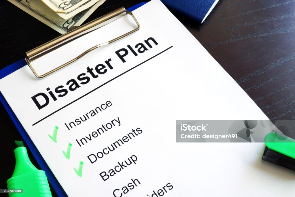Disaster Plan on a table. Emergency Planning Stock Photo