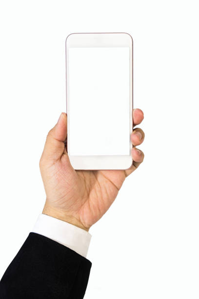 Hand of business man, wearing suit, holding smartphone with blank screen. Isolated on white background. stock photo