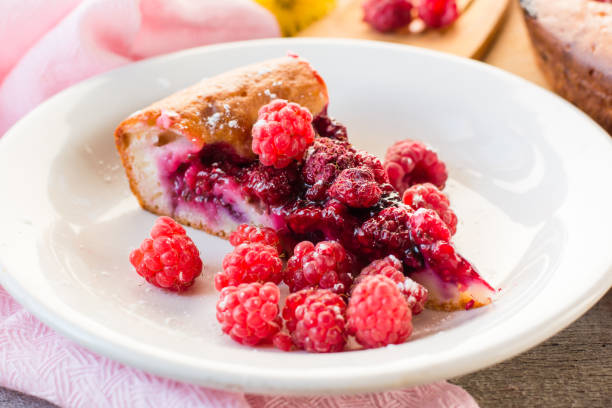 istock A piece of cake with raspberries and fresh berries 856904676