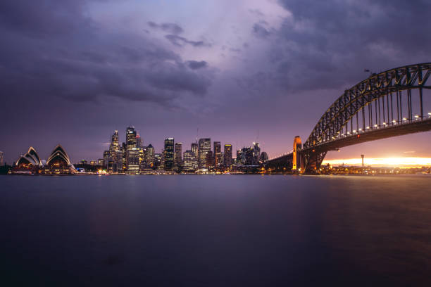 istock Sydney CBD and harbor illuminated at night 856905848